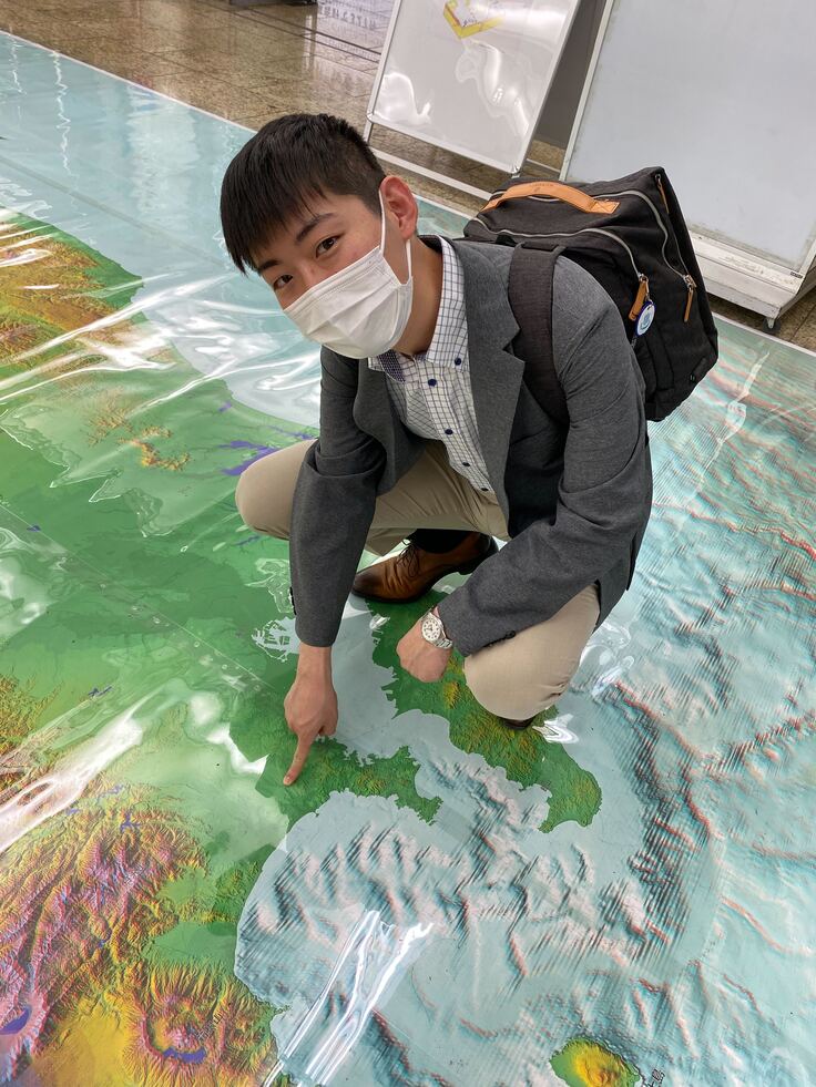 善行付近を指差すべっしー