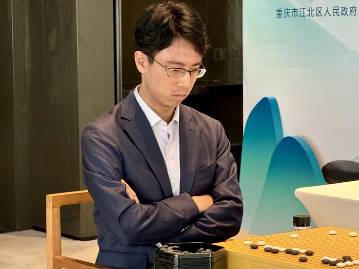 第1局に臨む一力九段