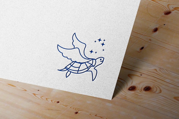 夢投資財団のウミガメのロゴ（青色）が厚紙で印刷されたイメージ